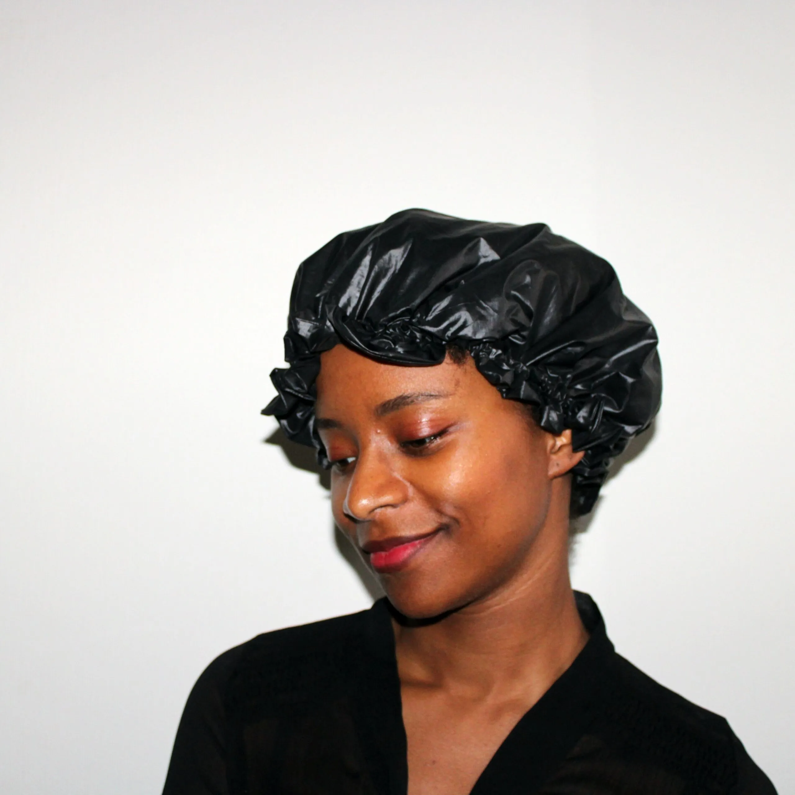 Bonnet de douche noir imperméable et soin ajustable - ALEGRIHEAD